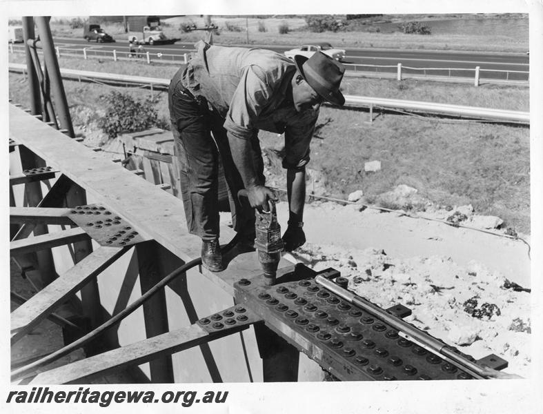 P00064
27 of 98 images showing views and aspects of the construction of the steel girder bridge with concrete pylons across the Swan River at North Fremantle.
