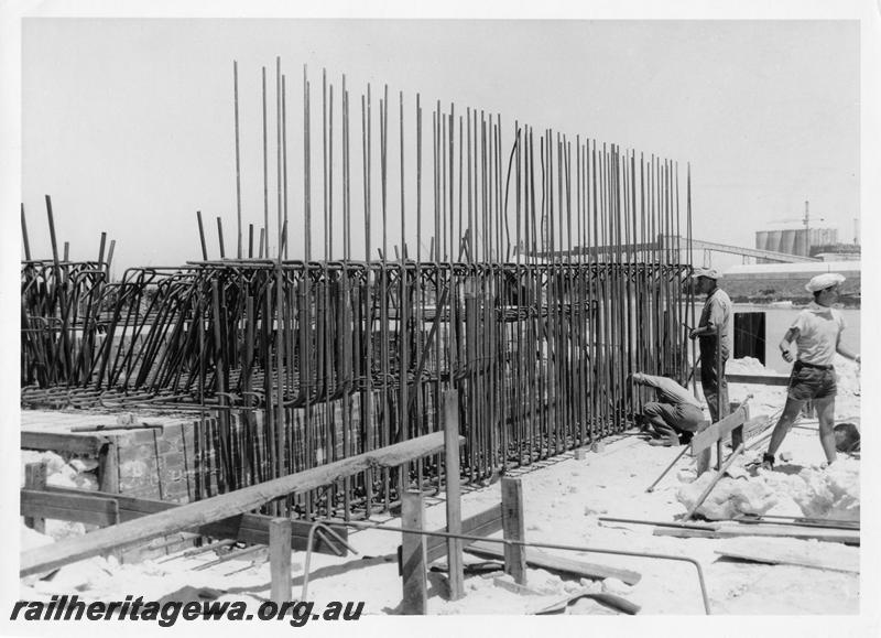 P00092
55 of 98 images showing views and aspects of the construction of the steel girder bridge with concrete pylons across the Swan River at North Fremantle.
