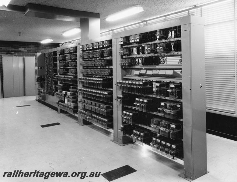 P00365
Relay room, Merredin Yard, view of banks of relays
