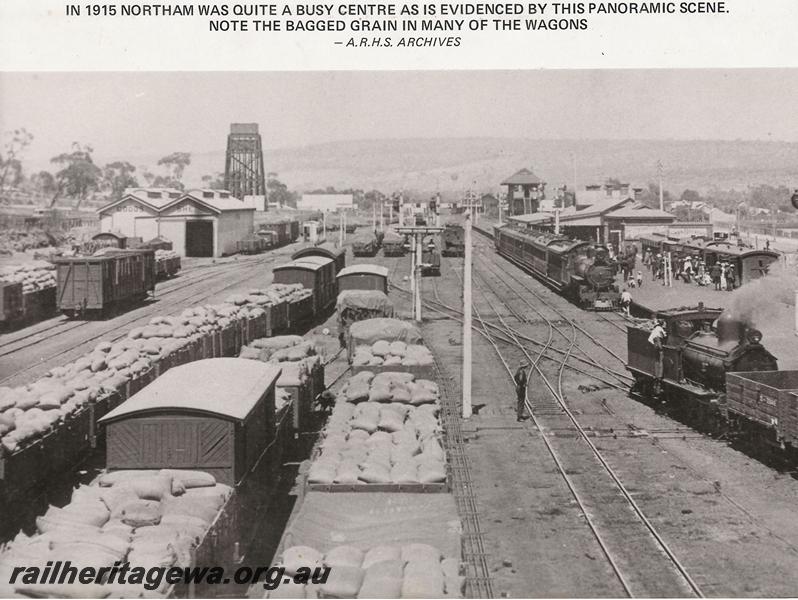 P00640
Station yard with loaded wagons, scissors crossover with double slip, station buildings, signal box, goods shed and the 50,000 gallon water tower, Northam, ER line, elevated overall view taken from the footbridge, same as P5325 & P5534
