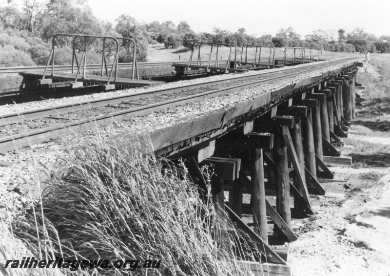 P01406
1 of 16 images of the pair of trestle bridges over the Canning River at Gosnells, SWR line, view along the bridge from the south east.
