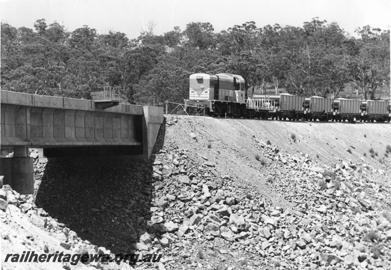 P01614
H class loco, WSH class ballast hoppers, at Wooroloo Bridge on the Avon Valley line, during construction. same as P0872
