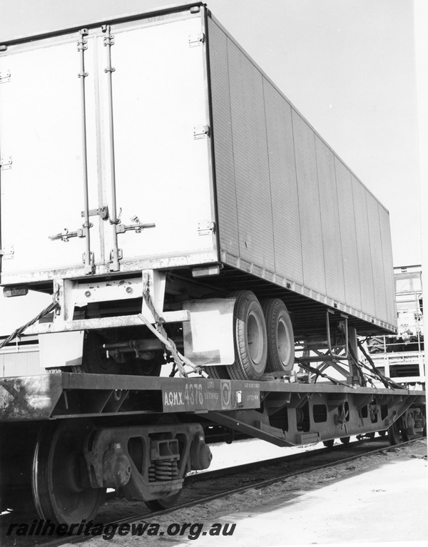 P02078
Semi trailer loaded onto a standard gauge flat wagon, Kewdale Piggy Back Area, view of the rear of the trailer
