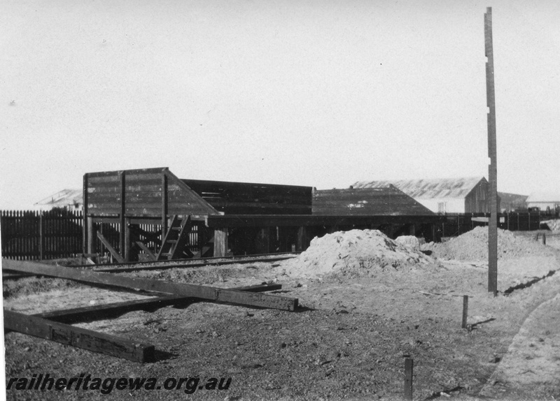P02093
14 of 44 views of the construction of the railway at Esperance, CE line taken by Cedric Stewart, the resident WAGR engineer, coaling stage completed, trackside view.
