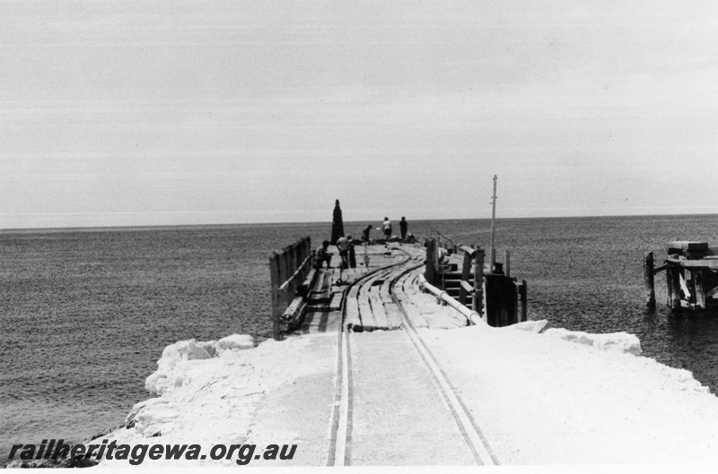 P02286
Jetty with tracks upon it, Rottnest Island, view along the tracks onto the jetty, Army jetty.
