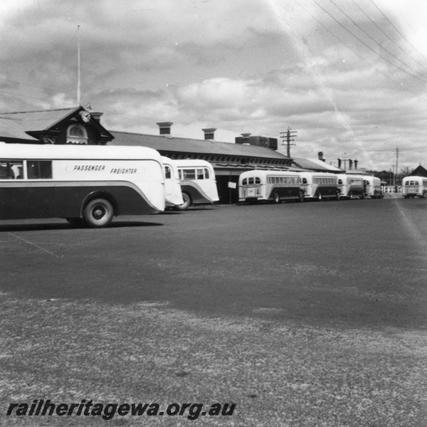 P02681
Railway Road Service buses,eight of parked outside the  Bunbury Railway Station, overall view of the station forecourt.
