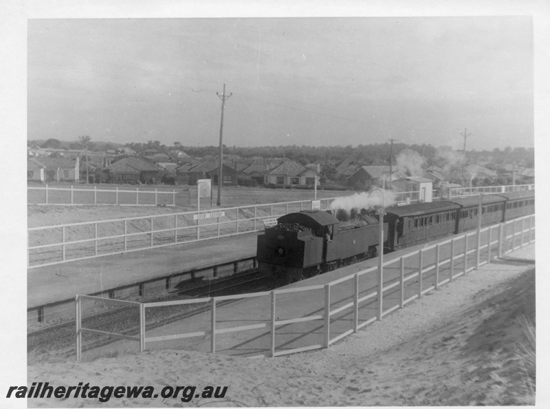 P03088
DM class 587 steam locomotive running bunker first, end and side view, suburban passenger carriages, nameboard, Show Ground, ER line. 
