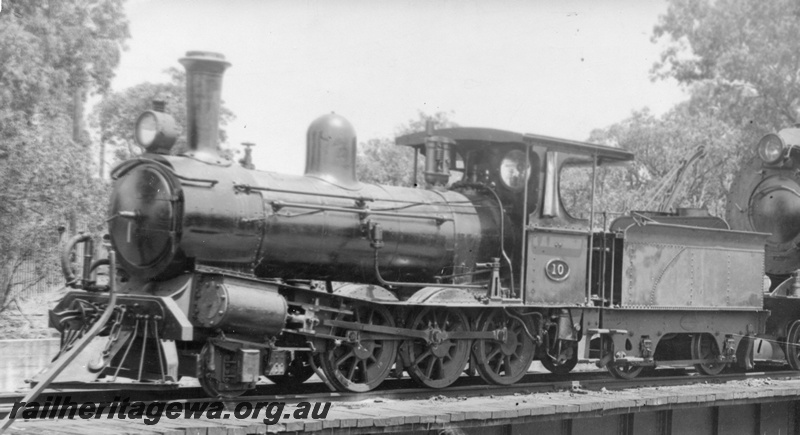 P03204
A class 10 steam locomotive on turntable, front and side view, c1943.
