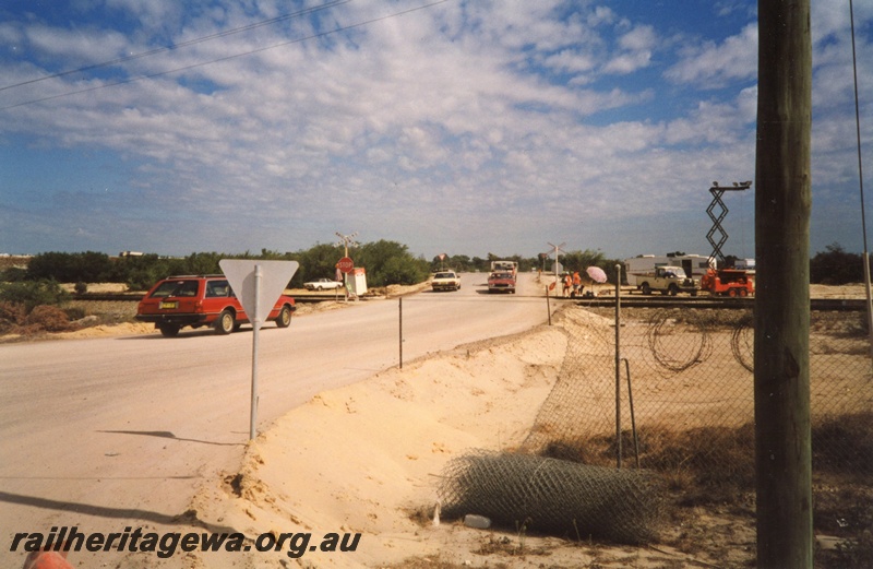 P03291
Level crossing, temporary road crossing over the standard gauge tracks at the southern end of Forrestfield Yard, Landbridge Project.
