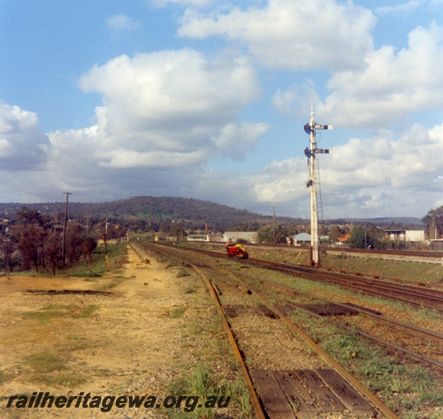 P03533
Length runner on a motorise trolley, signal with two arms, Bellevue, ER line, view looking east

