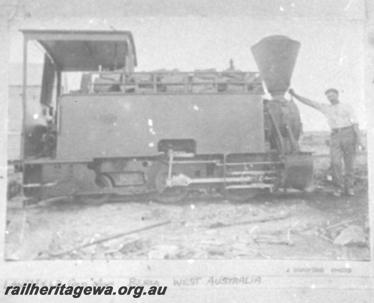 P03704
East Murchison United Gold Mine's Orenstein and Koppel 2 foot gauge 0-4-2T loco, builders No. 731 at Lawlers. Purchased in 1902, out of  use by 1912 and acquired by Kalgoorlie and Boulder Firewood Co. in 1916, side view. Photo taken pre 1916. Loco later named 