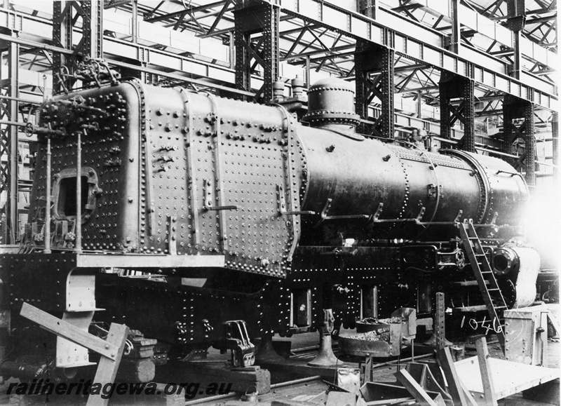 P04081
P class steam loco under construction, Fitting Shop, Block 3, Midland Workshops, end and side view of the firebox and boiler
