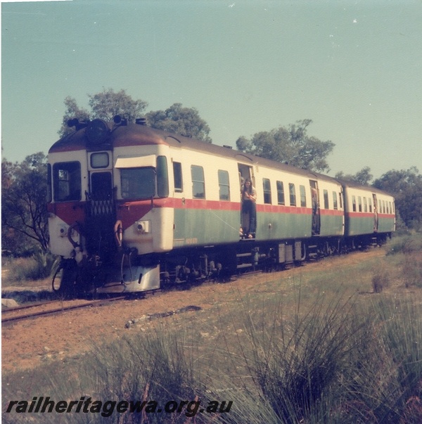 P04321
2 of 4, ADX class 670 diesel railcar, stainless steel cowcatcher,  and ADA class 767 trailer, front and side view, on ARHS tour to Bibra Lake, FA line.
