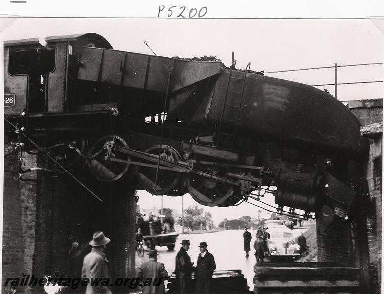 P05200
ASG class 26 Garratt, subway, Stirling Road, Claremont, derailed and hanging over the roadway.
