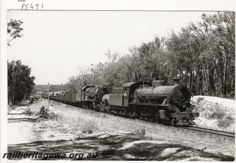 P05491
W class 920 double heading with an unidentified S class, near Shotts, BN line, goods train
