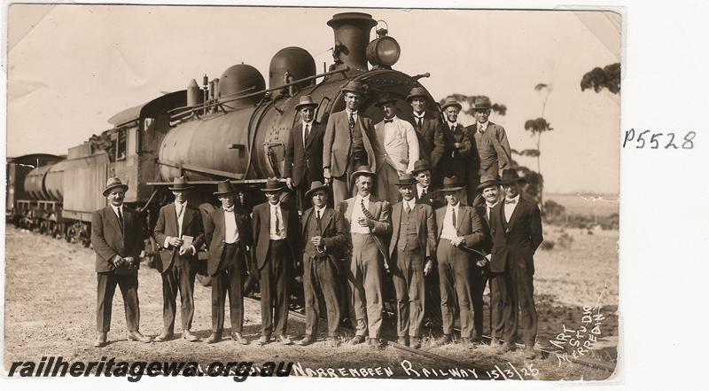P05528
 L class, dignitaries posing in front of the loco, opening Merredin to Narembeen Railway, NKM line.
