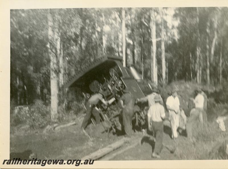 P05939
6 of 6 views of derailment of Millars loco No.72, view into cab with workers
