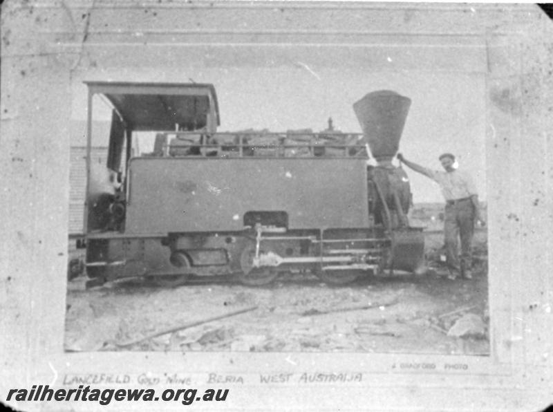 P06166
East Murchison United Gold Mine's Orenstein and Koppel 2 foot gauge 0-4-2T loco, builders No. 731 at Lawlers. Purchased in 1902, out of  use by 1912 and acquired by Kalgoorlie and Boulder Firewood Co. in 1916, side view. Photo taken pre 1916. Loco later named 