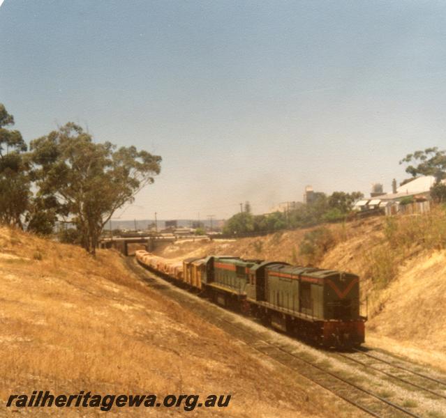 P06419
R class towing a dead DA class, West Leederville Bank, goods train
