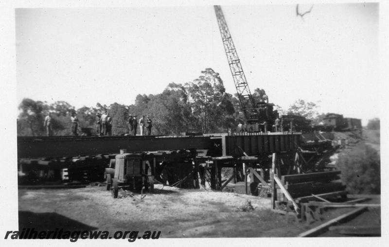 P06909
5 of 6 views of the replacement of the timber trestle bridge over the Serpentine River, just north of Serpentine Station with a steel girder bridge, SWR line.
