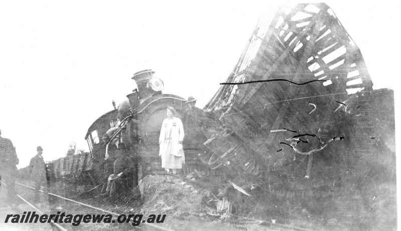 P07060
1 of 8 views of the smash at Wokalup, SWR line, view shows E class 354 having collided with some cattle wagons in the dead end track. 
