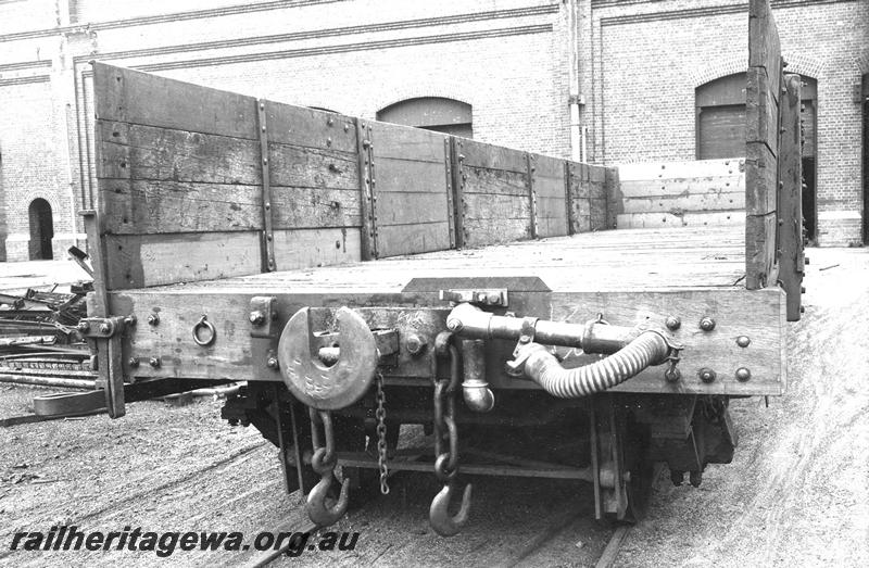 P07390
2 of 9 photos depicting wartime activities at the Midland Workshops, RAA class wagon converted for military purposes showing pivot joint vacuum  brake pipe in the mdown position, end view
