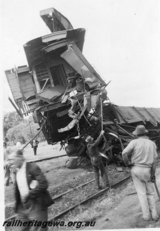P08136
5 of 7 views of the collision at Yarloop, SWR line, by a train headed by W class 951 and a stationary goods train. shows wrecked end of Z class 65
