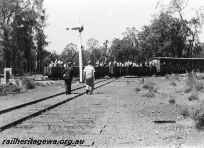 P08166
AA class 206 first class carriage and two R class wagons with passengers, grade crossing,  signal, ARHS tour train hauled by  Hawker Sidderley Building Supplies loco, ex WAGR CS class 270, Black Butte on the Banksiadale timber mill line crossing over the PN line, Wuraming for the ARHS Vic Division, train straddling the crossing
