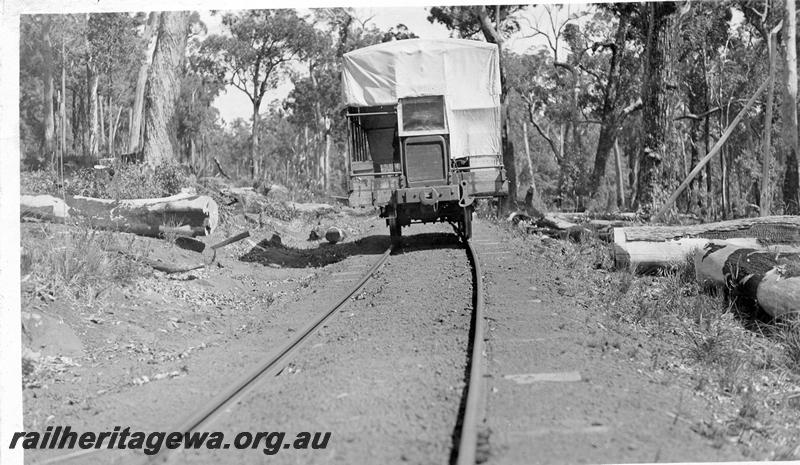 P08249
Millars pay car, Nanga Brook, motor vehicle converted to run on rails, head on view.
