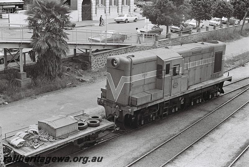 P09302
Y class 1111, NS class shunters float, Narrogin, GSR line, elevated front and side view.
