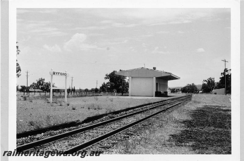 P09391
Byford, station building, platform, loading bank, nameboard. SWR line.
