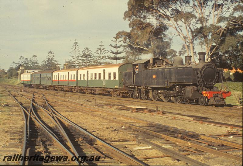 P09803
DM class 581 on suburban train, three different liveries on carriages, entering Claremont. ER line.
