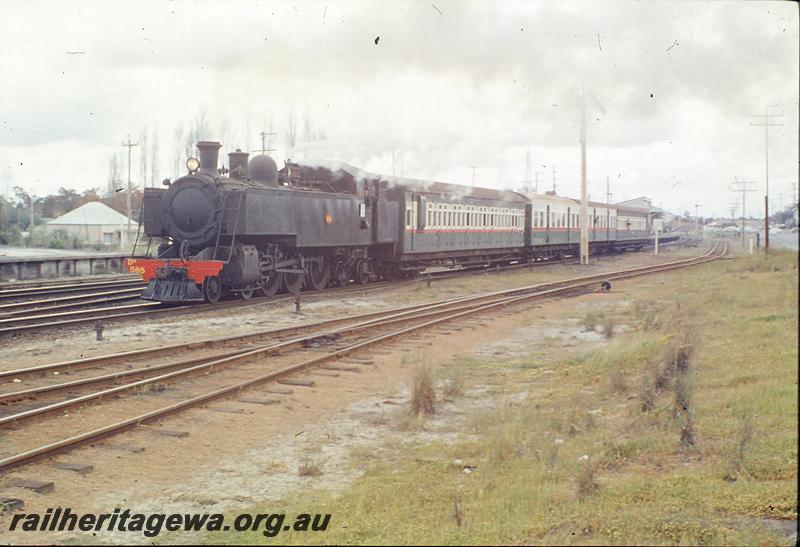 P09866
DM class 585, down show special, loading bank, station building, platform in background, semaphore signals, Welshpool. SWR line.
