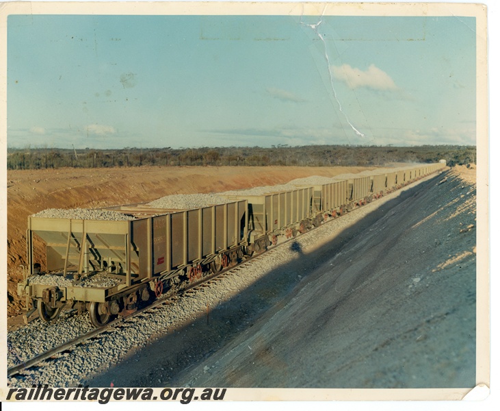 P10636
WSH class 30512 standard gauge ballast hopper at the rear of a ballast rake on the standard gauge line south of Kalgoorlie to Esperance.
