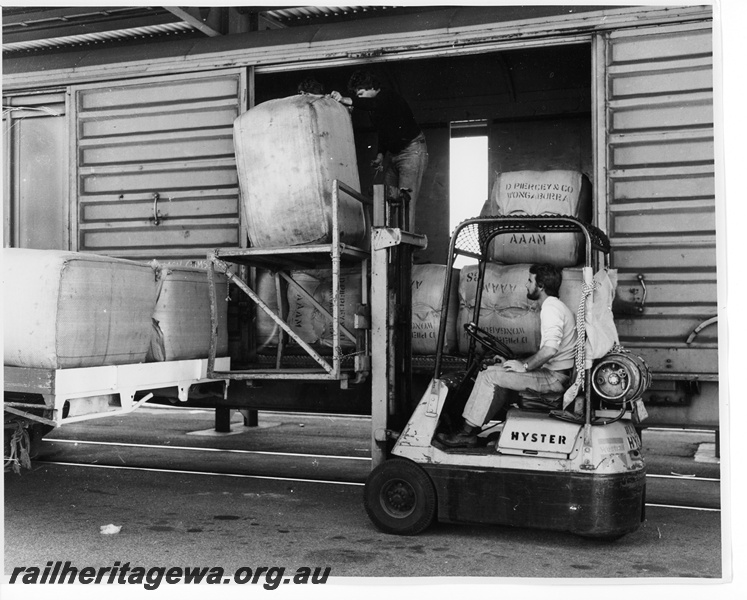 P10688
Hyster forklift unloading bales of wool from a VH class narrow gauge van at Robb Jetty.
