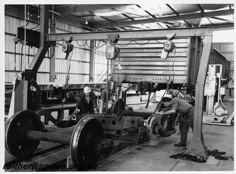 P10742
WGX class standard gauge open wagon having repair work performed on one of its bogies at the Wagon Repair depot at Forrestfield.

