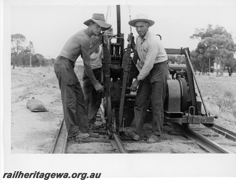 P10761
A spike pulling machine, front view, in use on the relaying of the Great Southern Railway.
