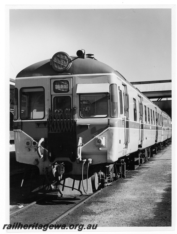 P10990
ADX class 666 heading DMU two car set, bound for Guildford, Perth station, ER line, front and side view
