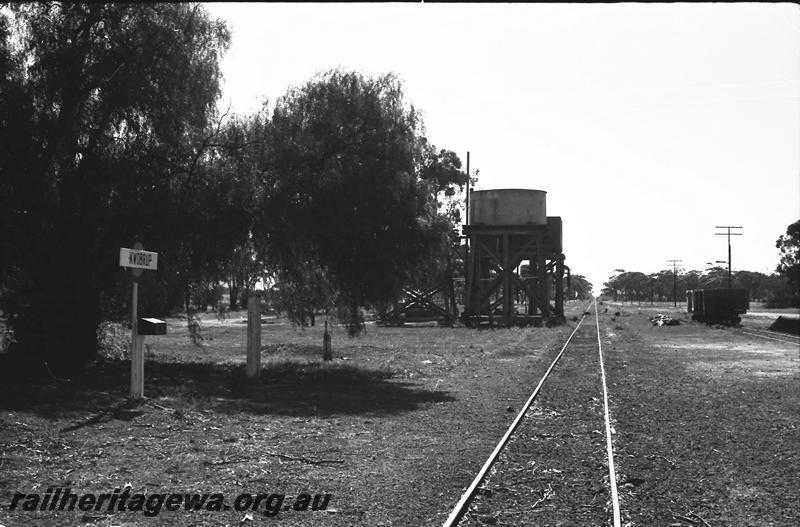 P11210
Two adjacent Water towers, one with a cylindrical corrugated iron tank and the other with a 25,000 gallon cast iron tank, Kwobrup, KP line, view along the track
