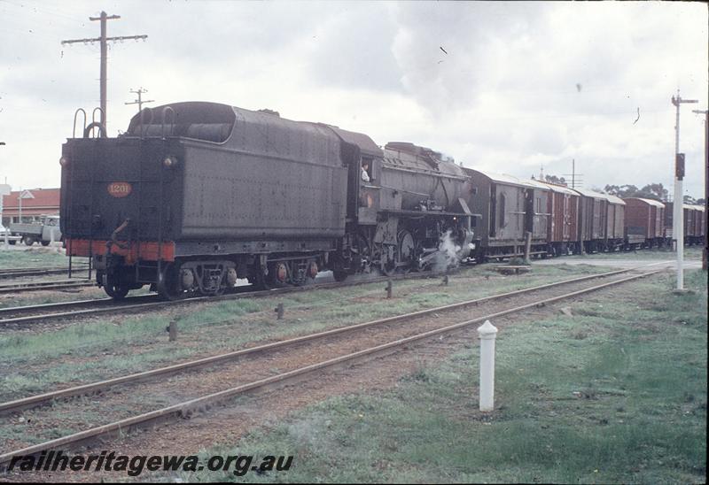P11521
V class 1201, assisting in rear of up goods hauled by V class 1210, departing Narrogin, no disc on rear of loco. GSR line.
