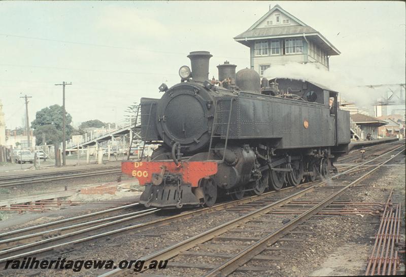 P11594
DD class 600, light engine, down main to loco shed, footbridge, signal box, station building, platform, East Perth. ER line.

