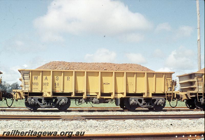P11728
WO class 31256 iron ore wagon, side view, first iron ore train, Kwinana yard. FM line.
