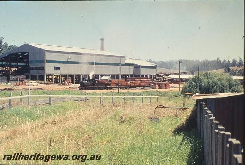 P11806
Pemberton mill, general view, State Saw Mills loco ,SSM 7 departing with  two loaded  QC class bogie flat wagons  for Pemberton yard, PP line

