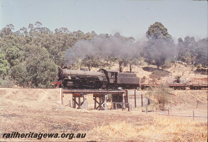 P12387
W class 922, 193 goods, crossing a short trestle bridge with second part of train. PN line.
