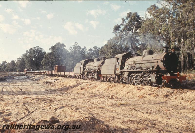 P12422
W class 937, W class 917, approaching Greenbushes, PP line. Additional wagons including stock wagon for brake power.
