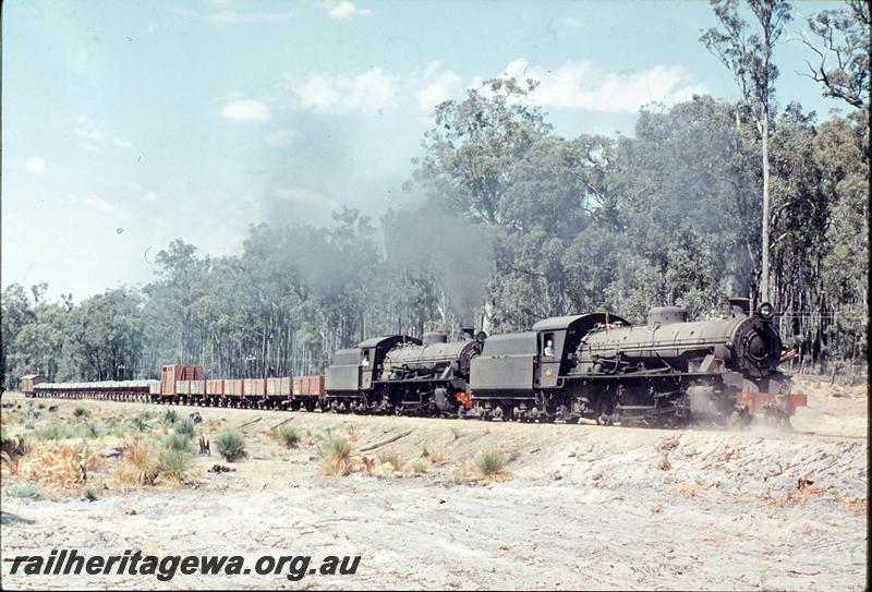 P12430
W class 922, W class 924, ballast train near Hester, PP line. Additional wagons for brake power.
