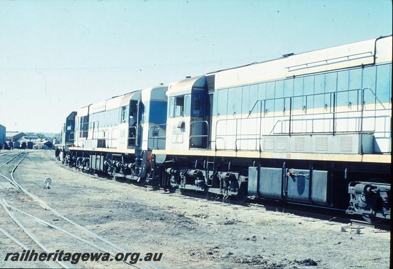 P12458
AB class 1533, on SG transfer bogies, being shunted into Midland Workshops by K class 204, K class 206. End of workshops in background.
