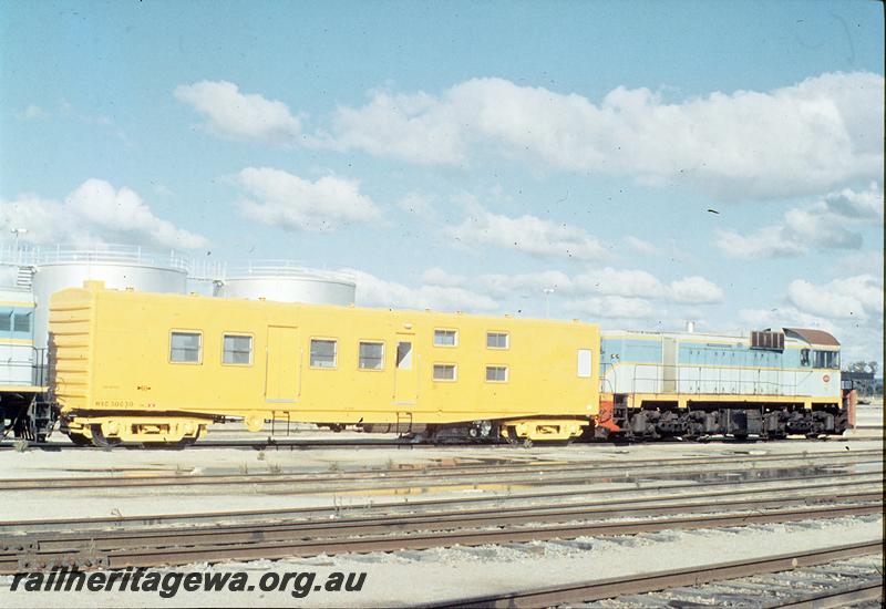 P12494
WSC class 30630 standard gauge breakdown train's Crew Living Van, J class, as new, Forrestfield Yard, end and side view,  SG line.
