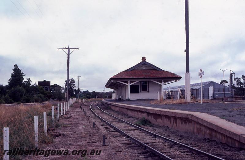 P12503
Station building, water tower, Tambellup, end view north side GSR line
