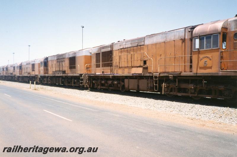 P12539
Goldsworthy Mining line up of redundant A class English Electric locomotives, similar to the WAGR K class, No.5 in front, lined up at Nelson Point yard following BHP take over of Goldsworthy Mining Limited
